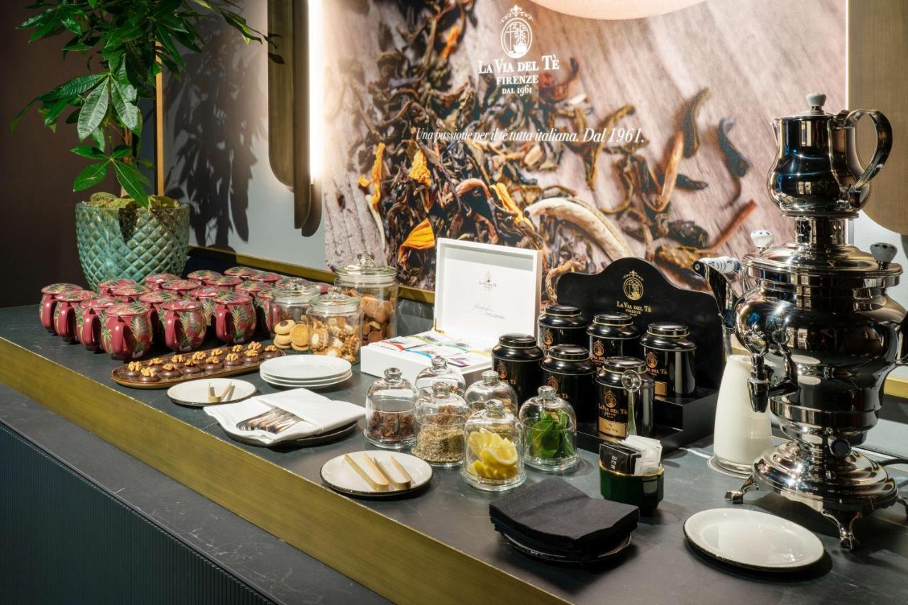Radisson Collection Hotel, Palazzo Touring Club Milão Exterior foto A selection of teas at the airport lounge of the Munich Airport Center