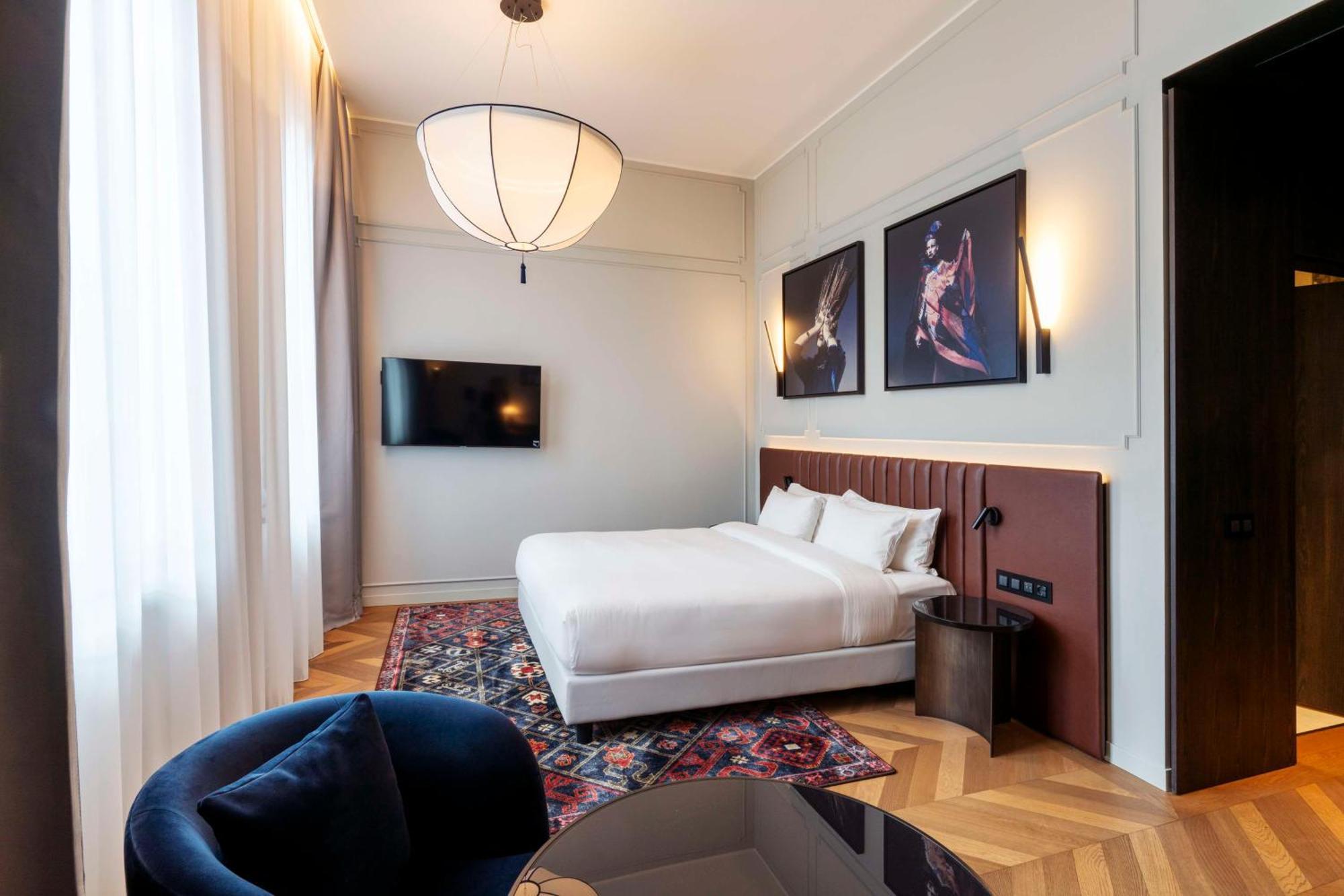 Radisson Collection Hotel, Palazzo Touring Club Milão Exterior foto A bedroom at the hotel